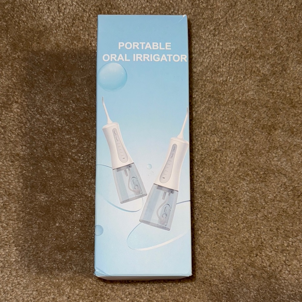 Portable Oral Irrigator in Black  and Smoke Gray, NEW